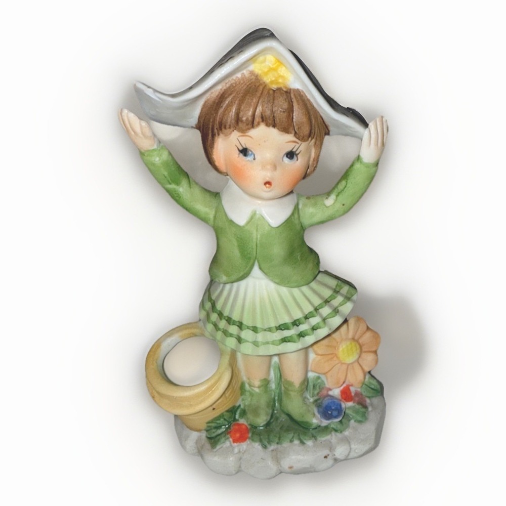 Vintage Girl Holding Newspaper On Head Porcelain Figurine